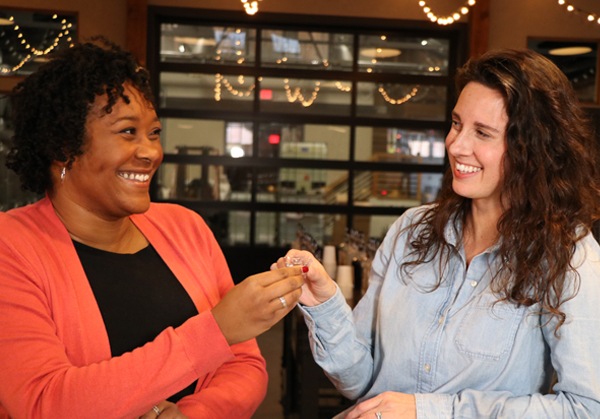 Two guests cheers their McClintock spirits samples